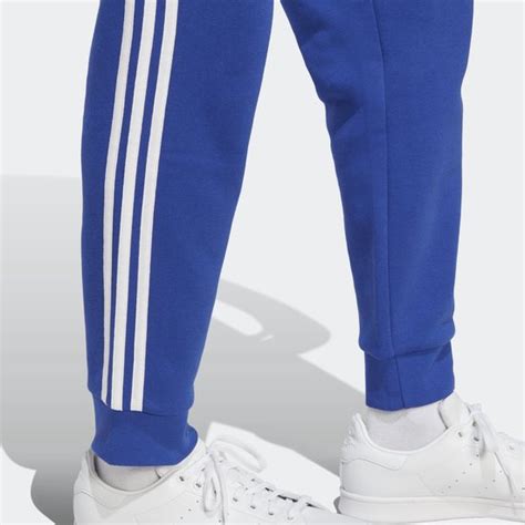 adidas schoenen blauw rood|Adidas adicolor broek.